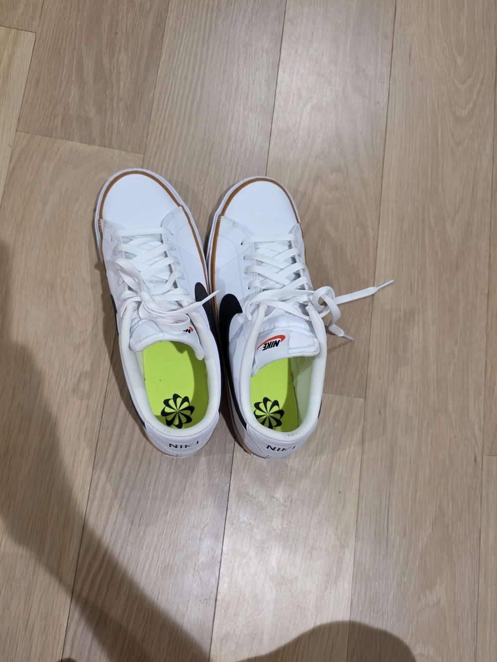 Nike Kids' White Low-Top Sneakers with Black Swoosh
